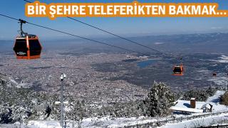 Bir şehre teleferikten bakmak. Teleferik gezisi
